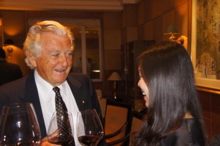 Mr. Hawke chats with a guest